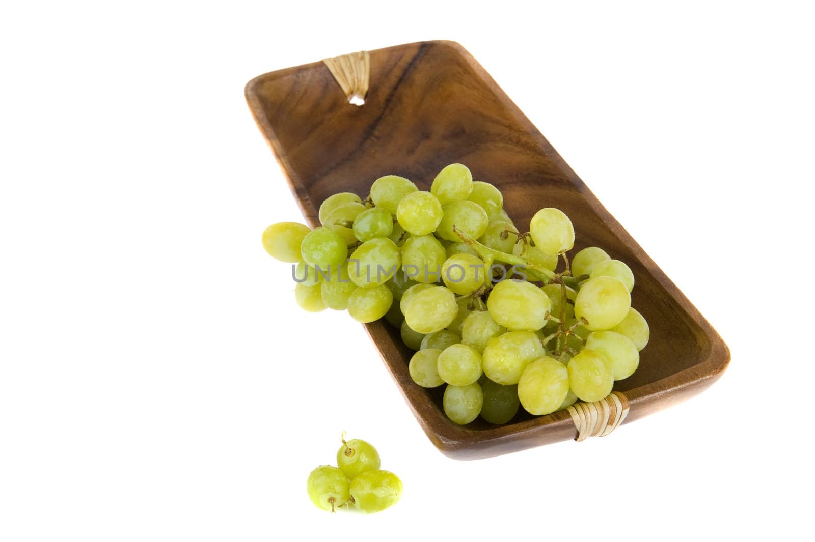 grapes in a wooden tray