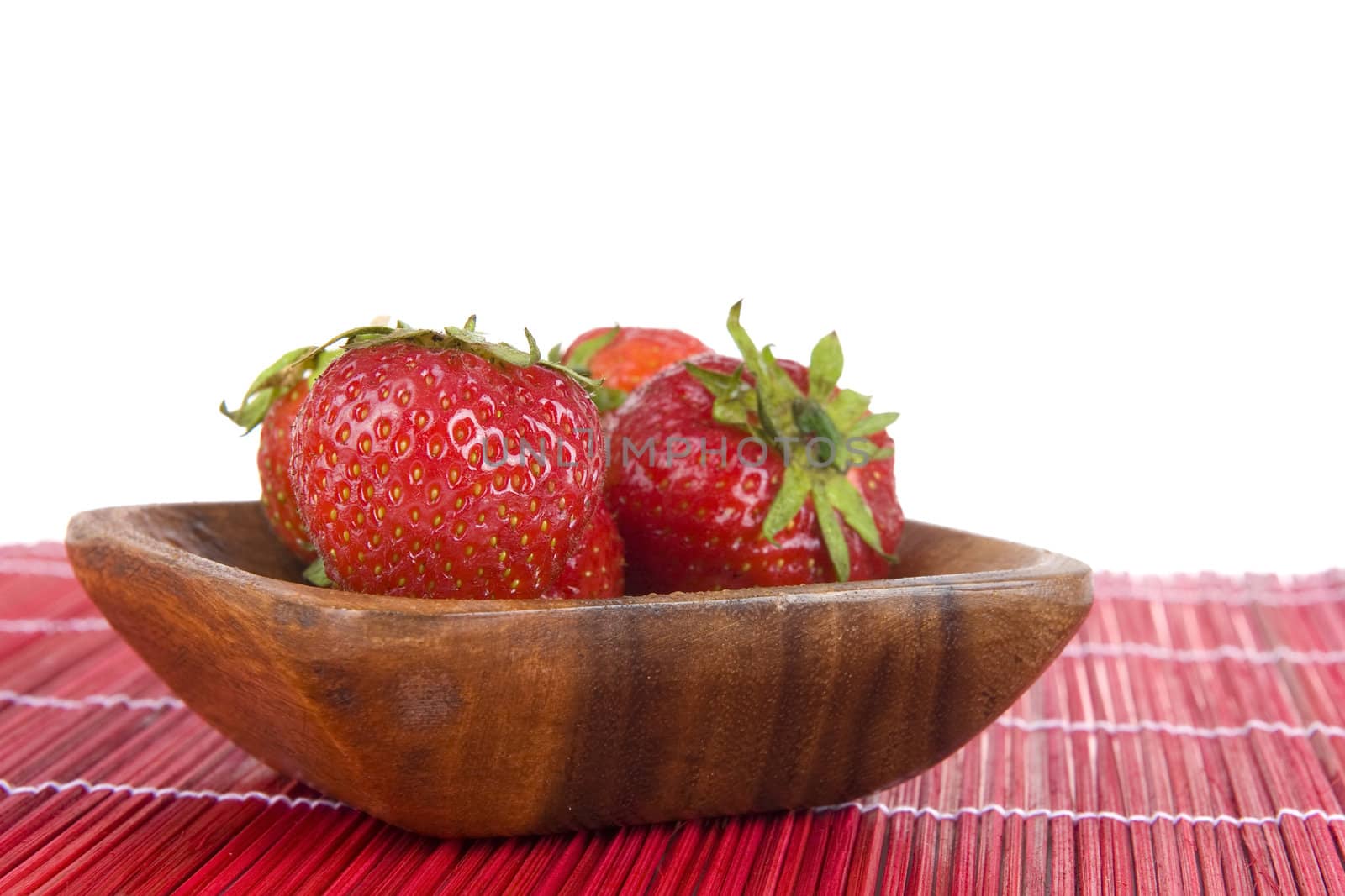 strawberries in a wooden tray