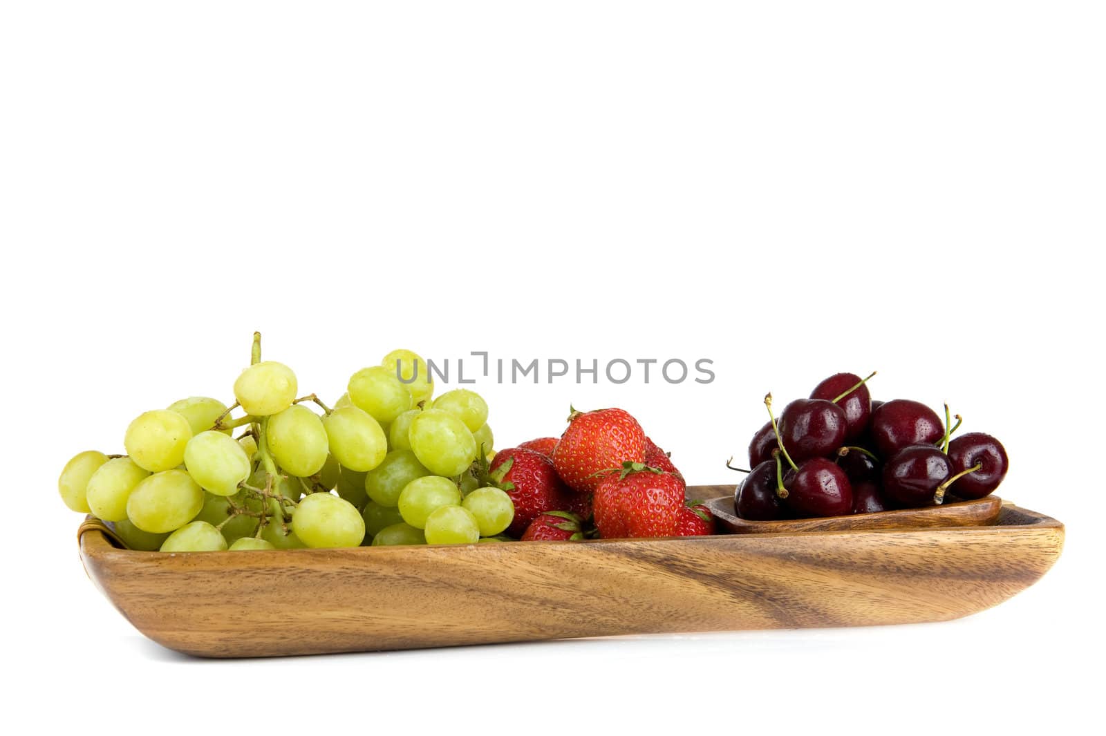 summerfruit in a wooden tray