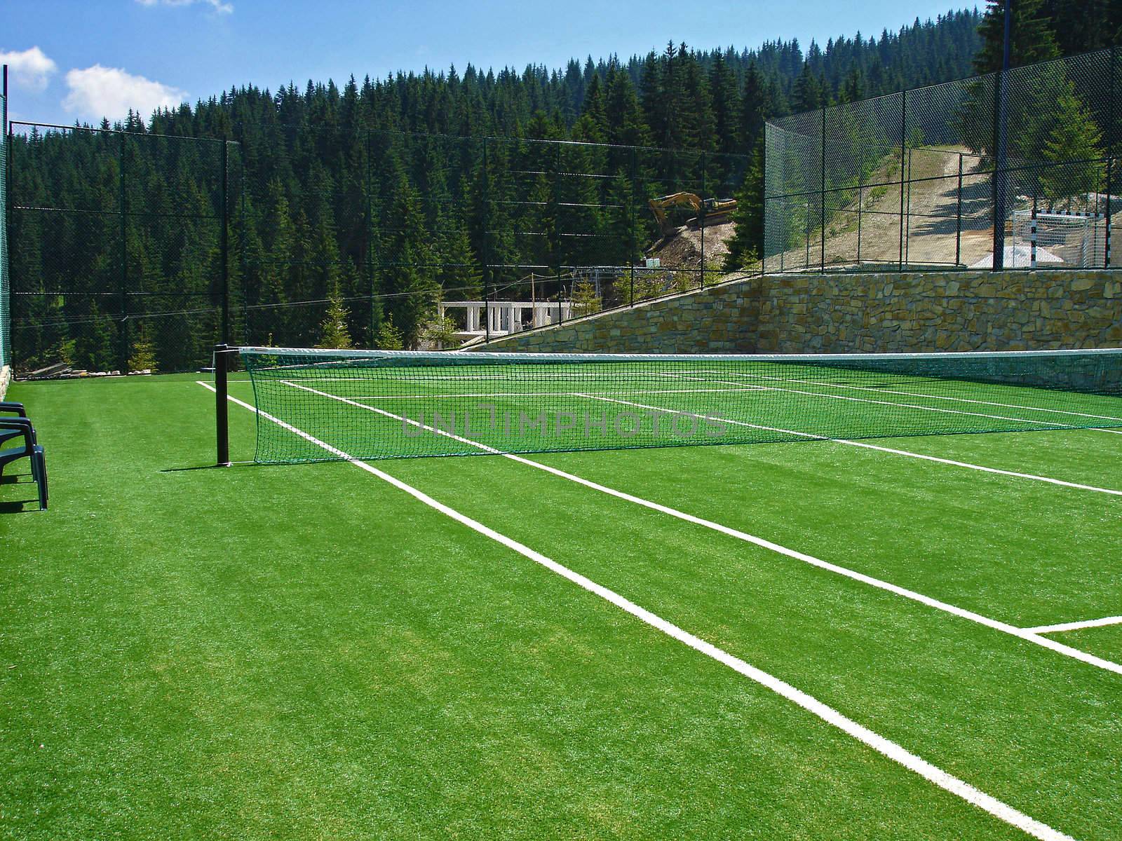 empty tennis field in the mountains          