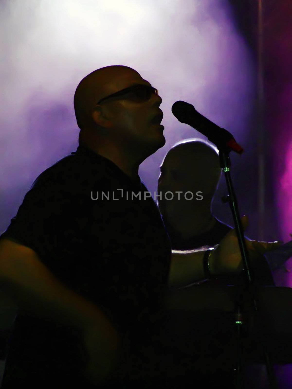 Popular vocalist and his rock band from Malta performing at outdoor gig