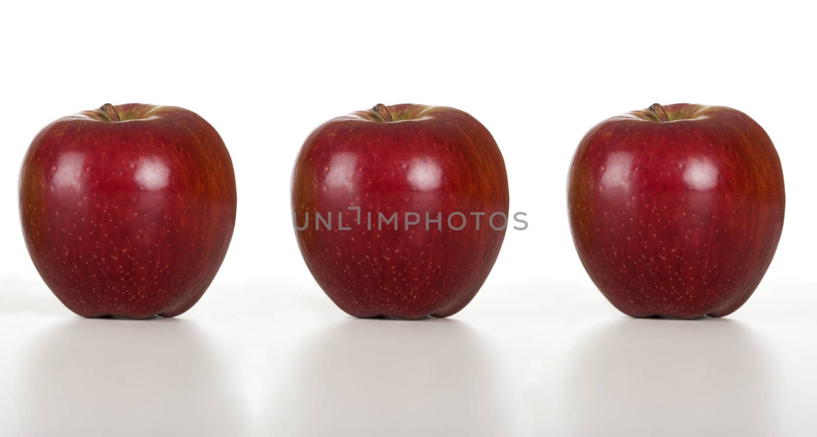 Picture of red healthy apples isolated on white