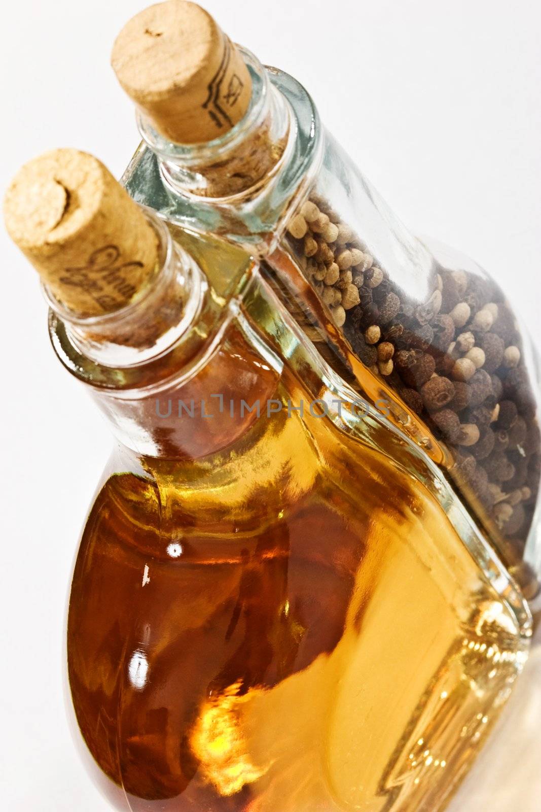 Full olive oil bottle close up, foodstuff
