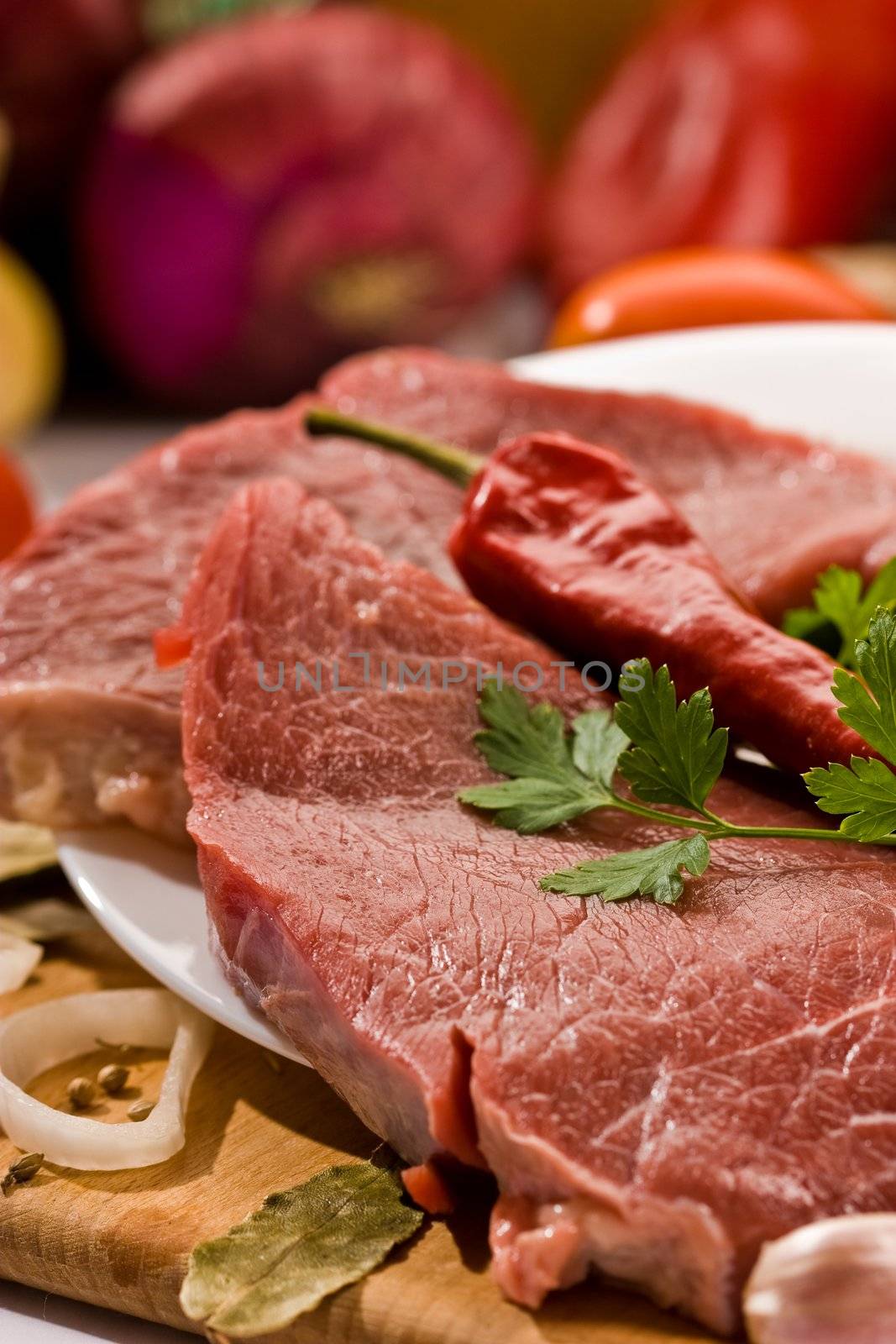 macro picture of meat and vegetables on the wood board