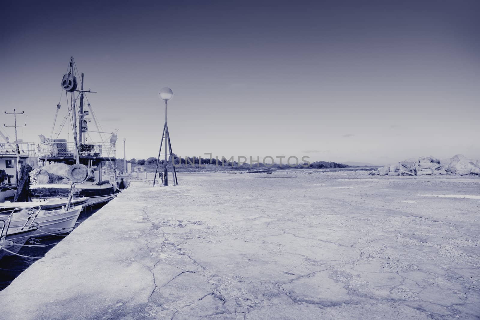 Fishing boats at the port , toned photo