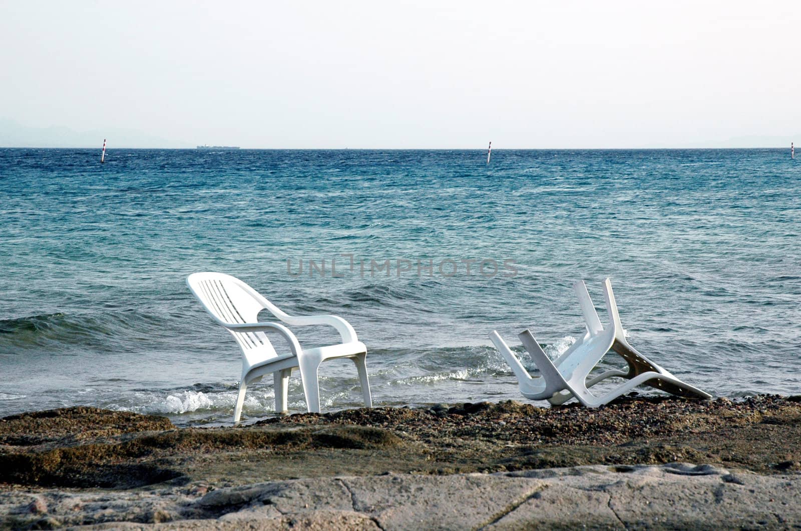 Chairs on seacoast