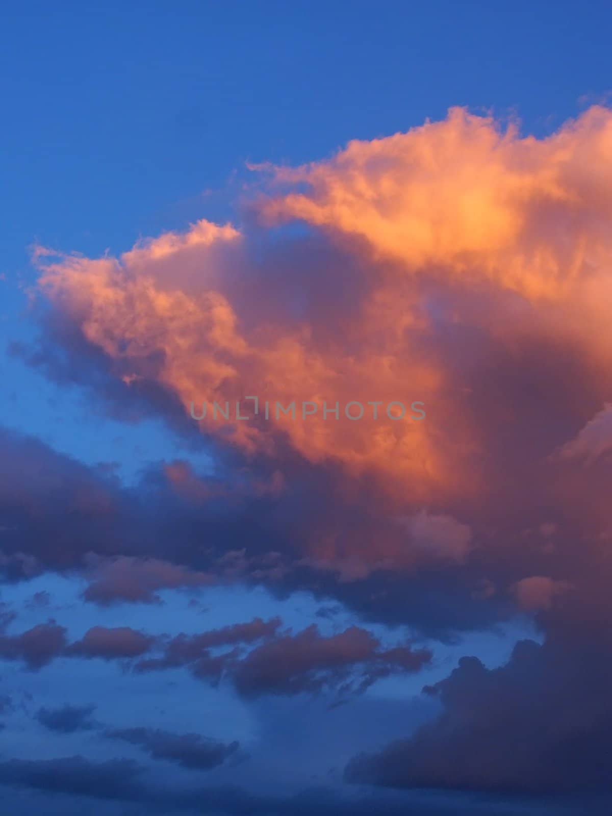 Clouds catching the last rays of sunlight.