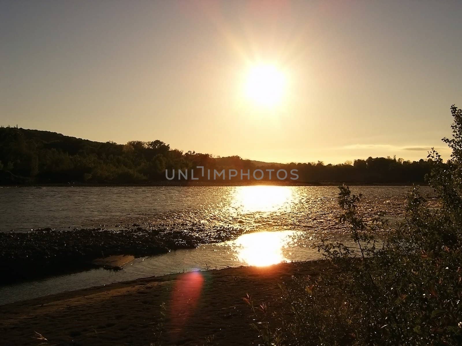 Evening; sun; background; tree; bright celestial landscape; type;  river; panorama;  beauty; colour; water; sunshine; sky; nature, coast, waves