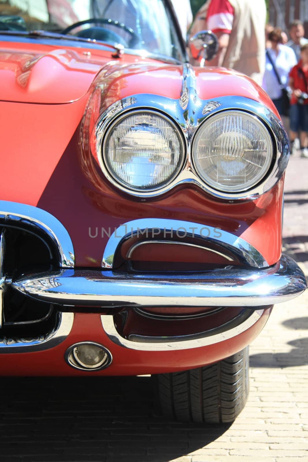 Front of a classic American car by studioportosabbia