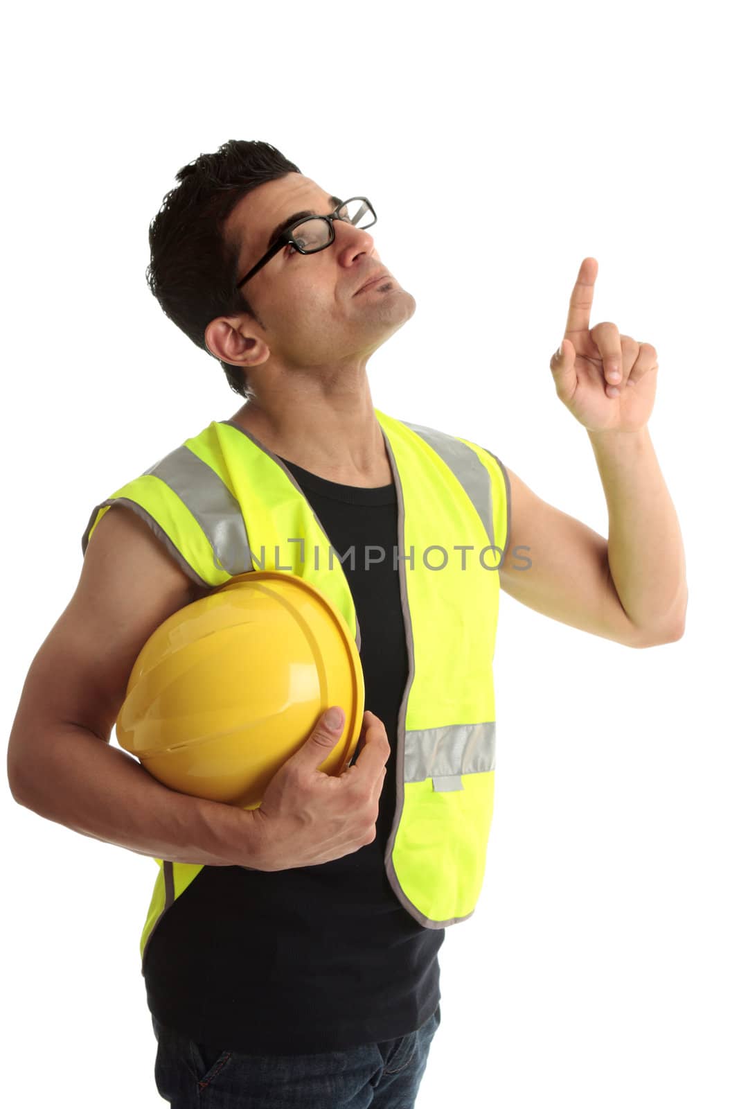 A male builder, construction worker or other trade labourer looking up and pointing his finger.  White background.  Suitable also for your message.