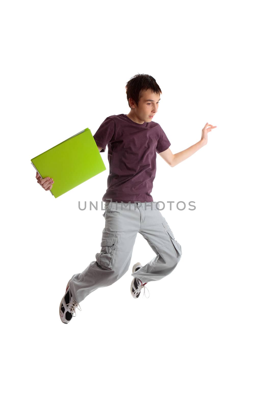 Excited male student jumping leaping high into the air.  White background.
