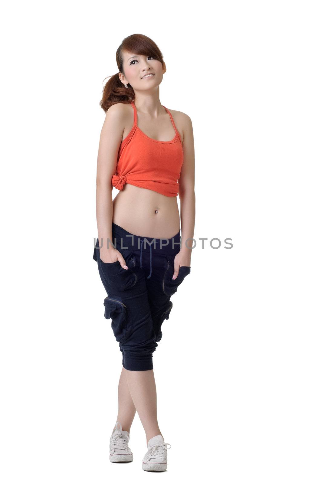 Young sport girl standing and looking copyspace, full length portrait of Asian woman isolated on white background.