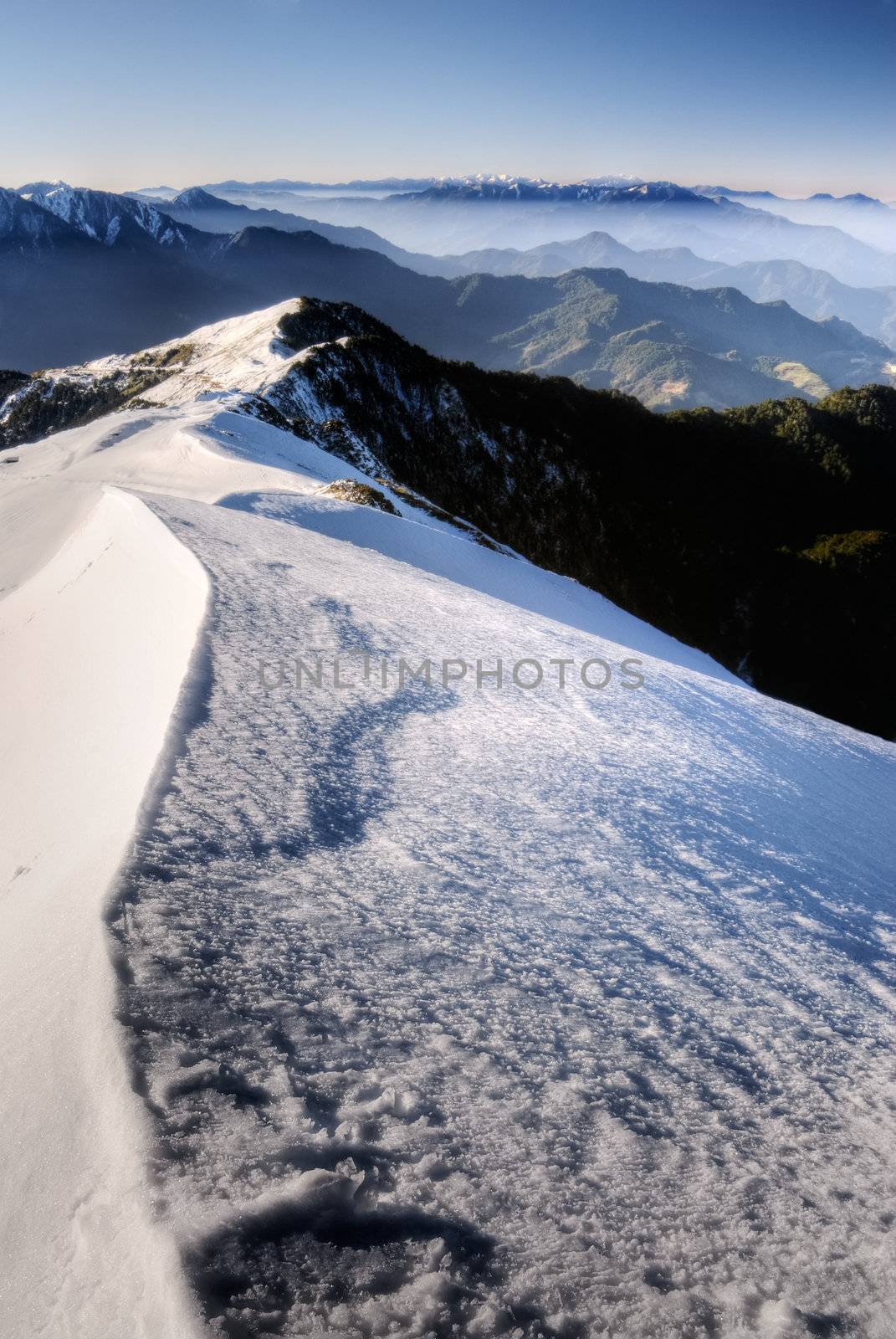 Snow mountain scenic with white slop and blue sky in Taiwan, Asia.