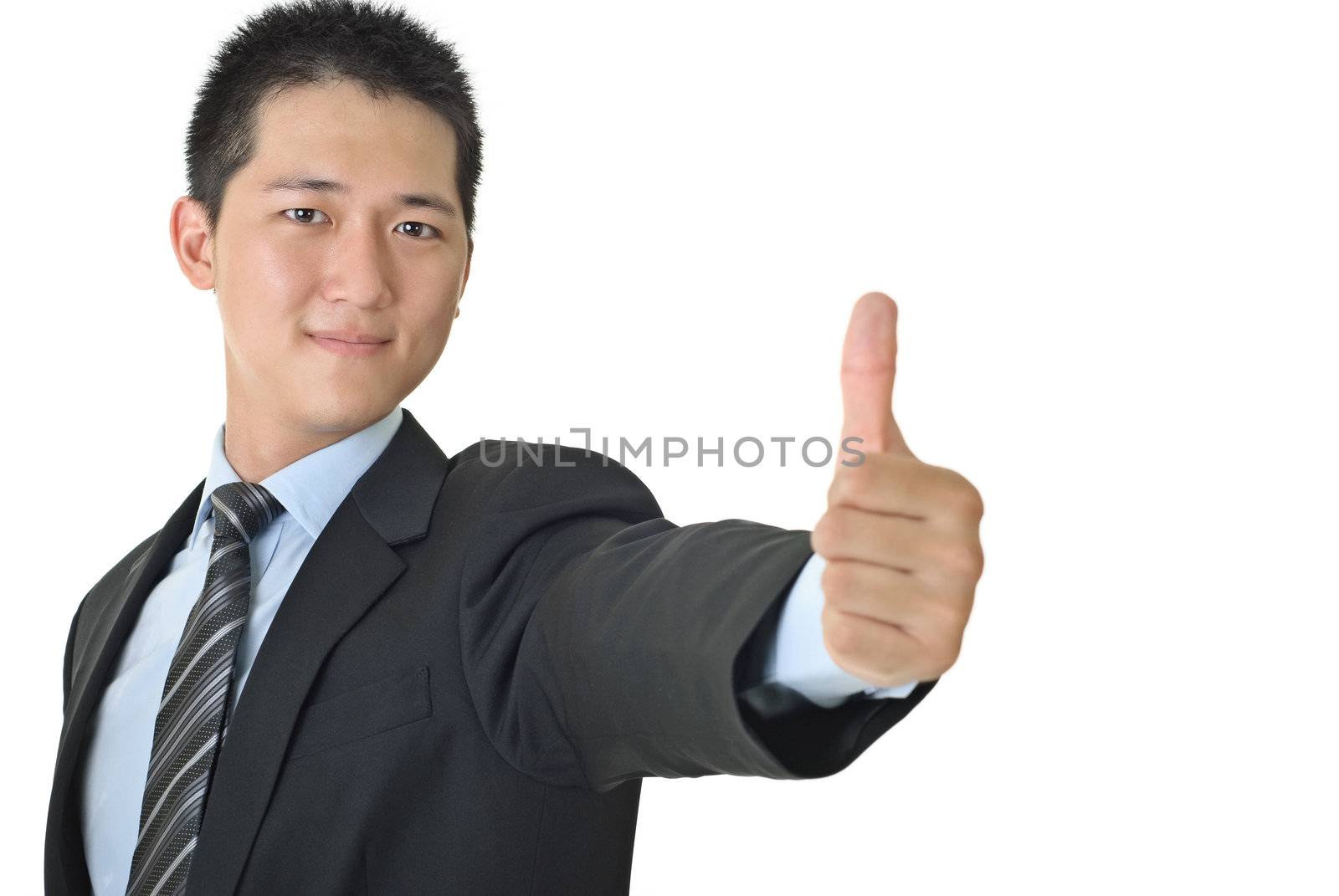 Successful young business man give you excellent sign with white copyspace.