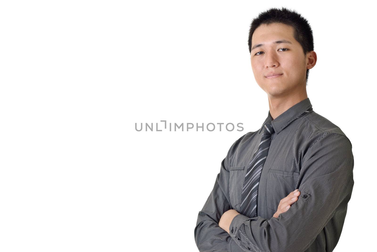 Successful young businessman with copyspace, closeup portrait of Asian office man on white background.