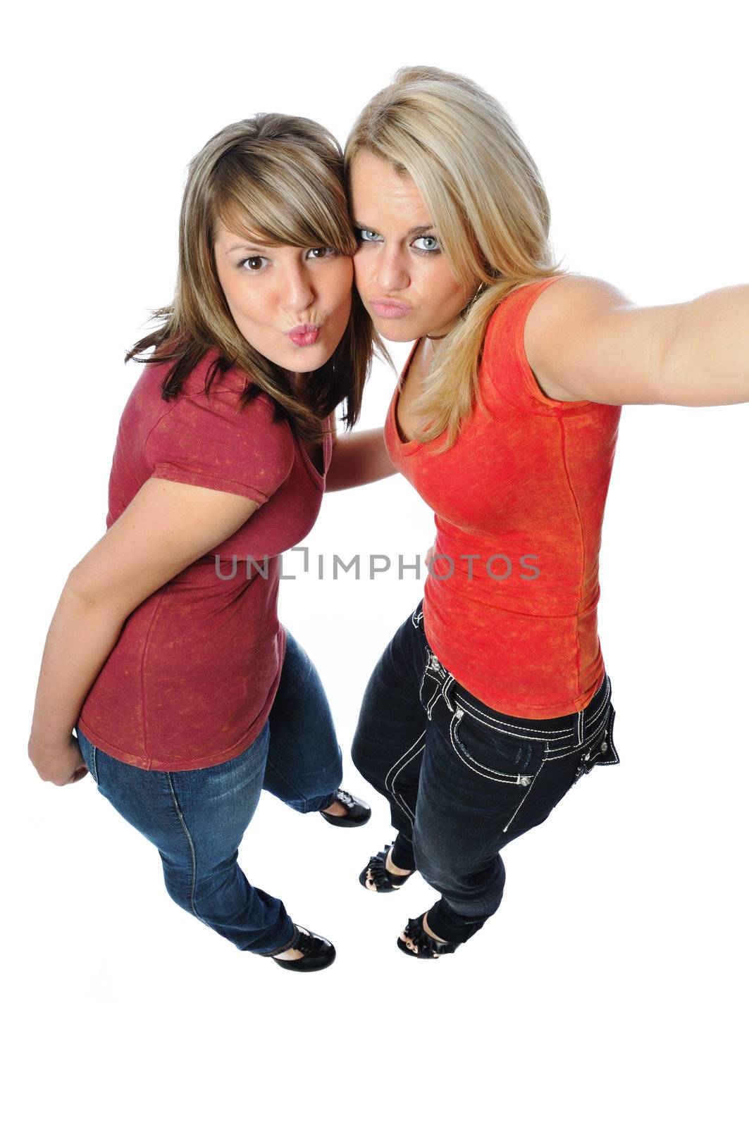 two friends posing together on a white background