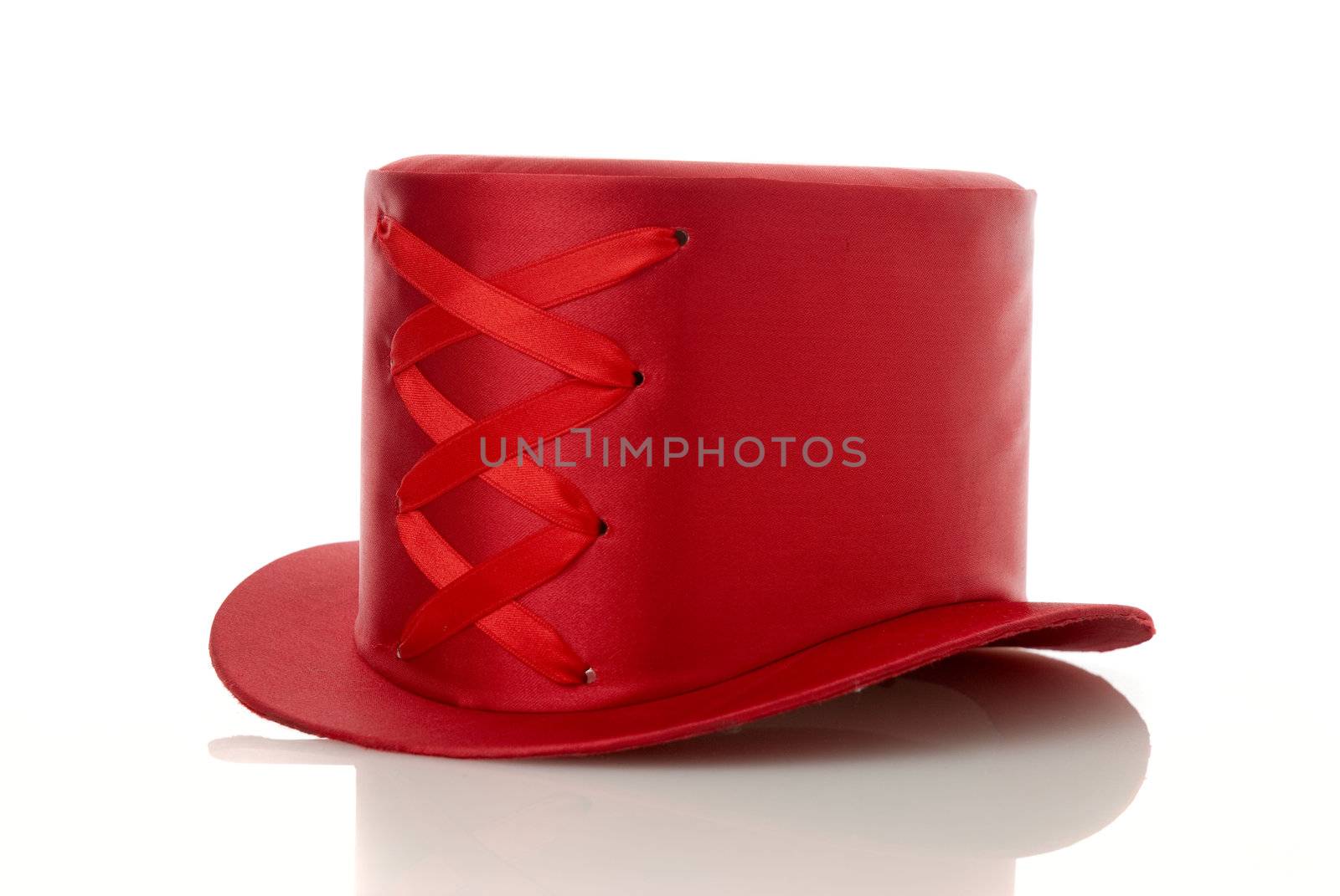 Red hat with ribbon isolated on white background.