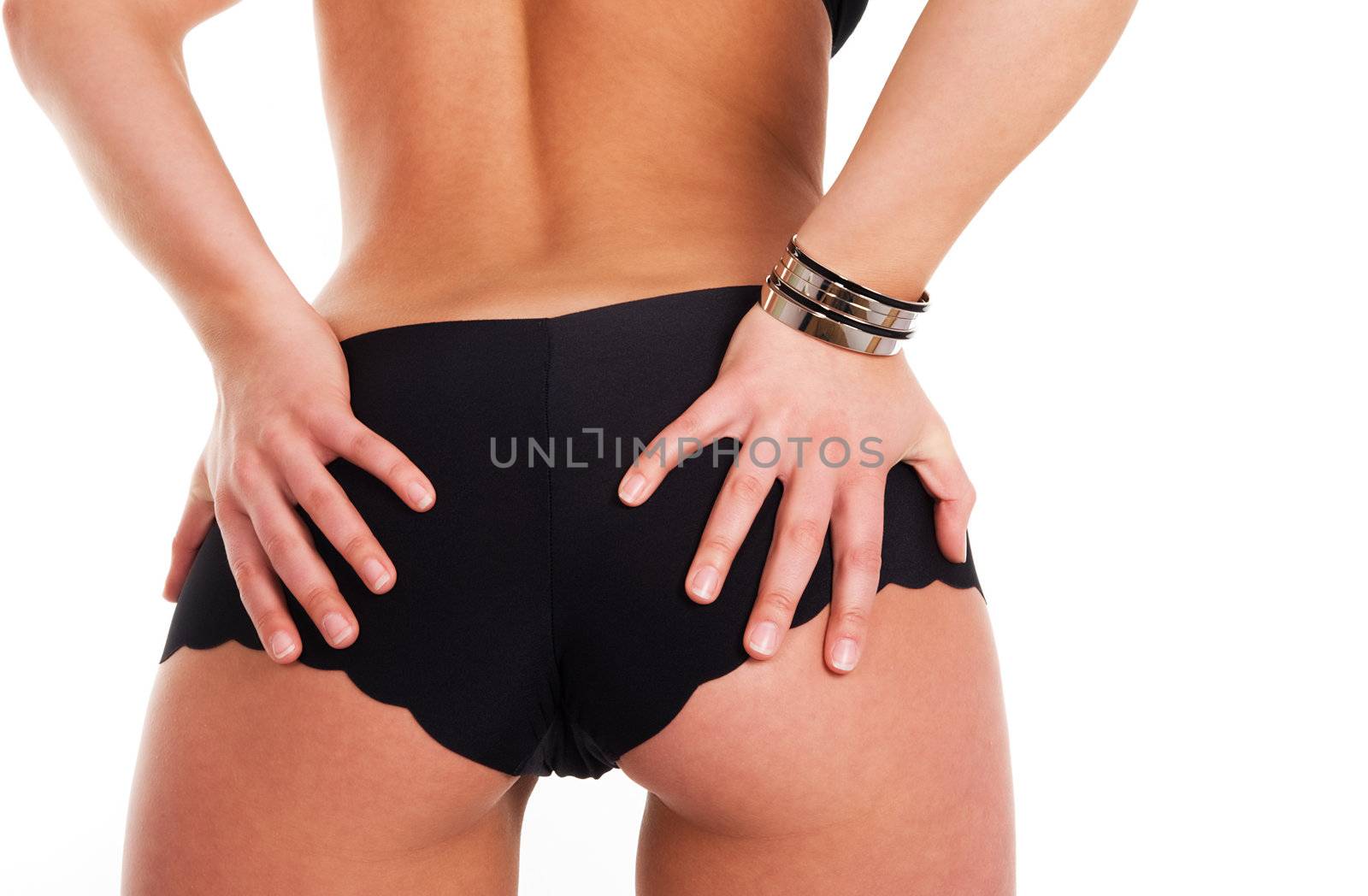 View of a girls butt seen against white background