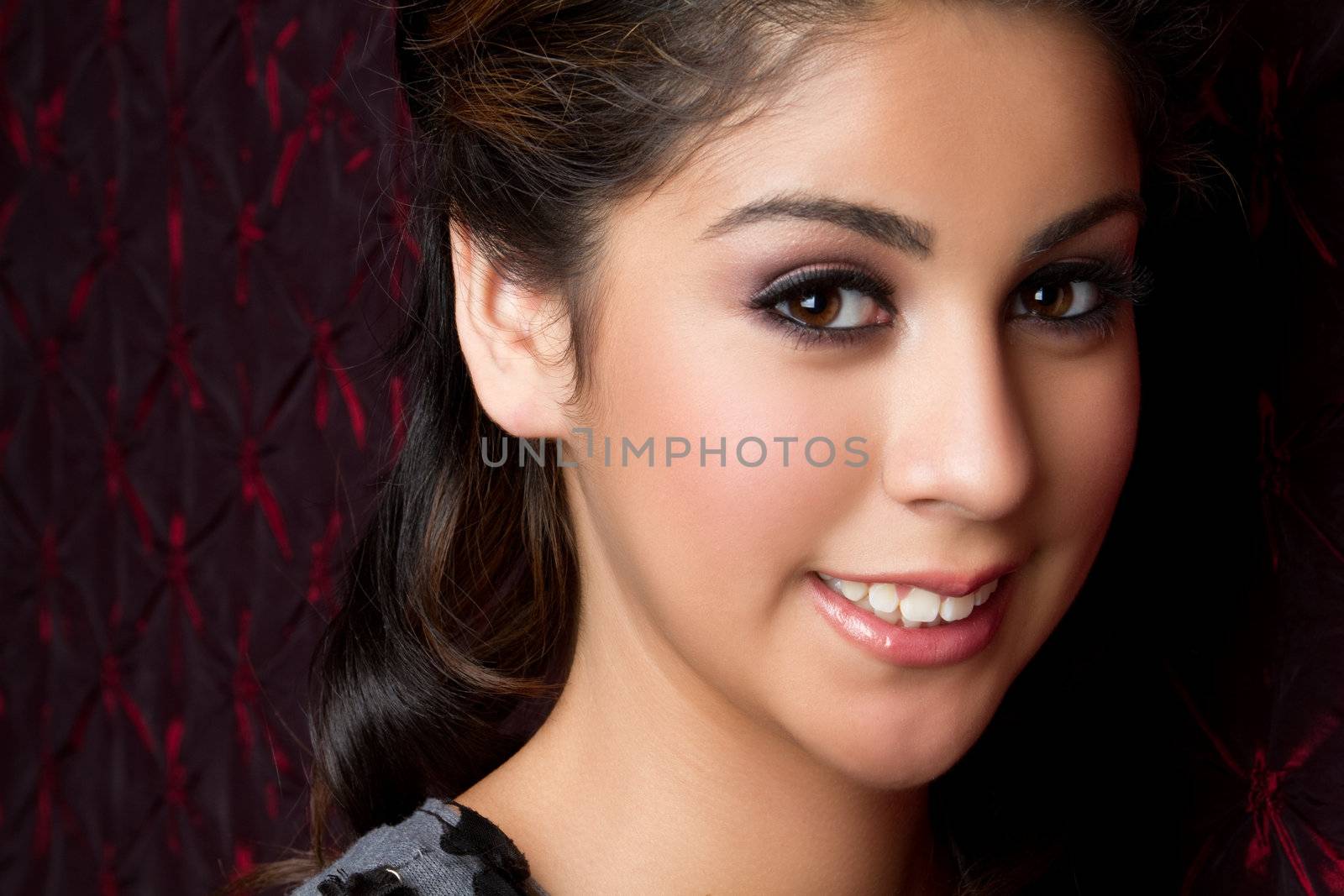 Beautiful smiling young woman closeup