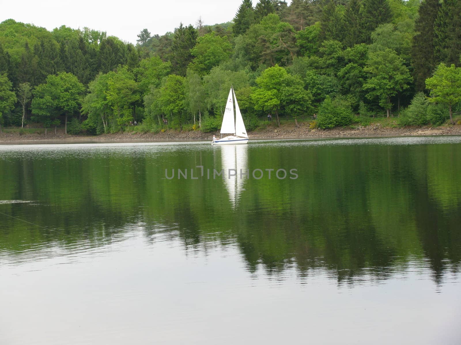 Sailing ship with reflexion in the lake by koep