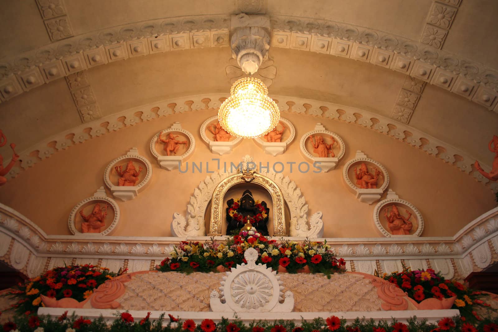 The architecture of the ceiling of a beautifully decorated Ganesha temple in India.