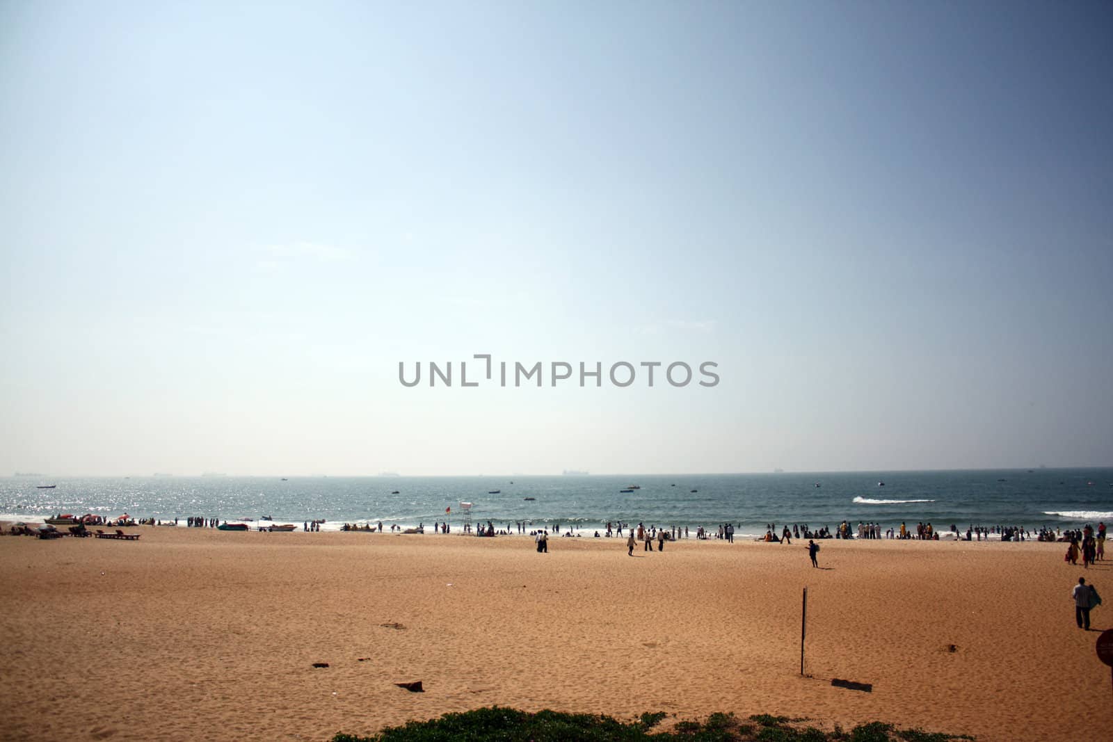 A crowded beach in Goa, India.