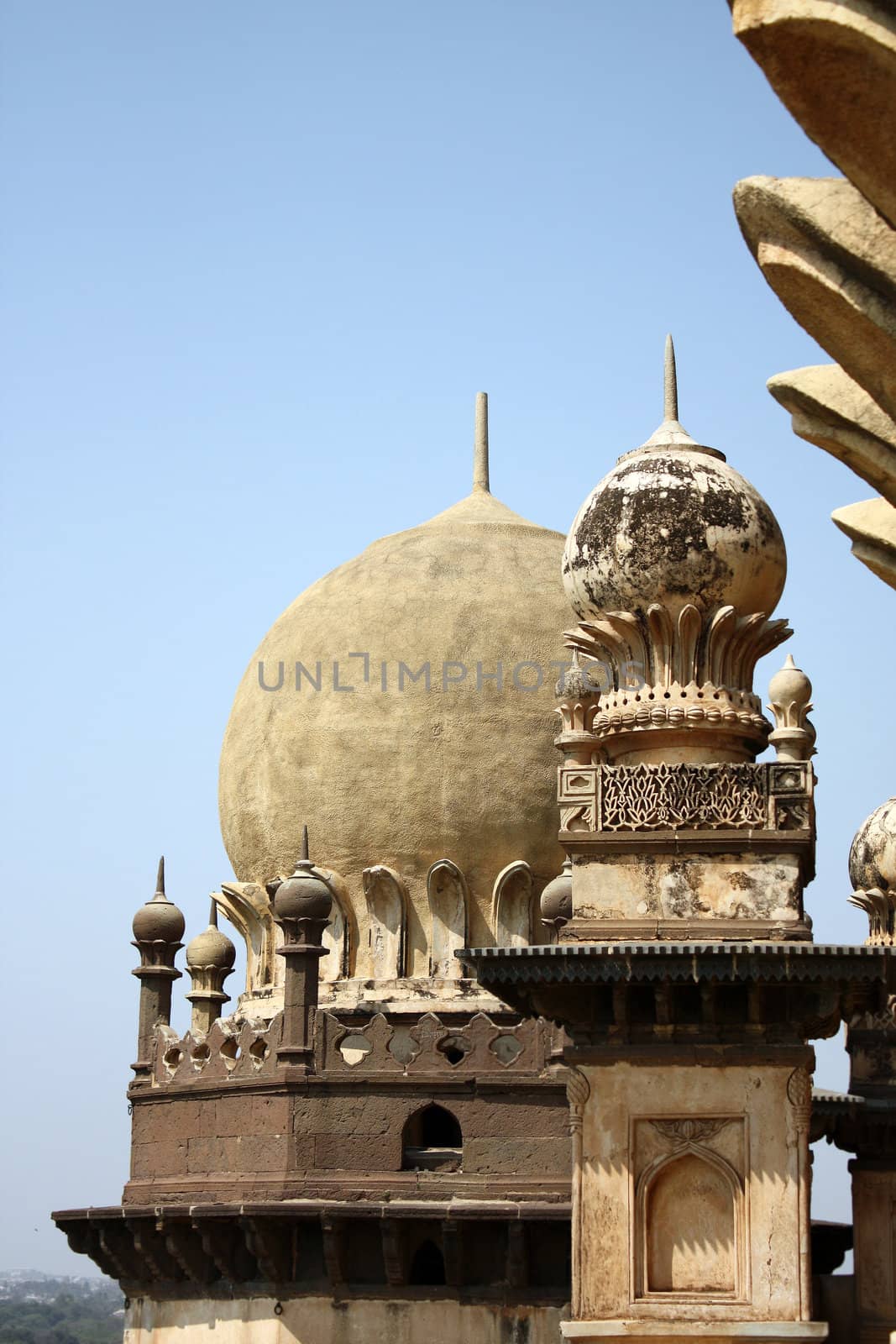 The details of the beautiful towers of the ancient Gol Gumaz in Bijapur, India.