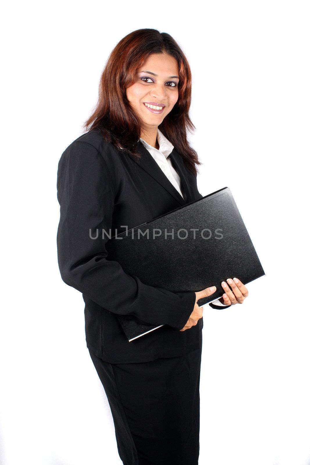 A confident Indian businesswoman with a file, on white studio background.