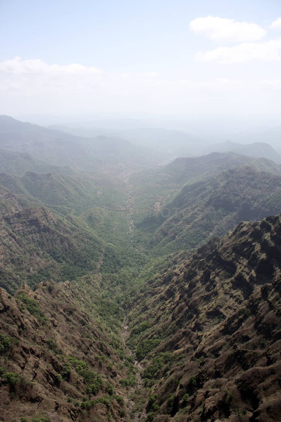 An aerial view of a huge deep valley in the Western Indian mountains.