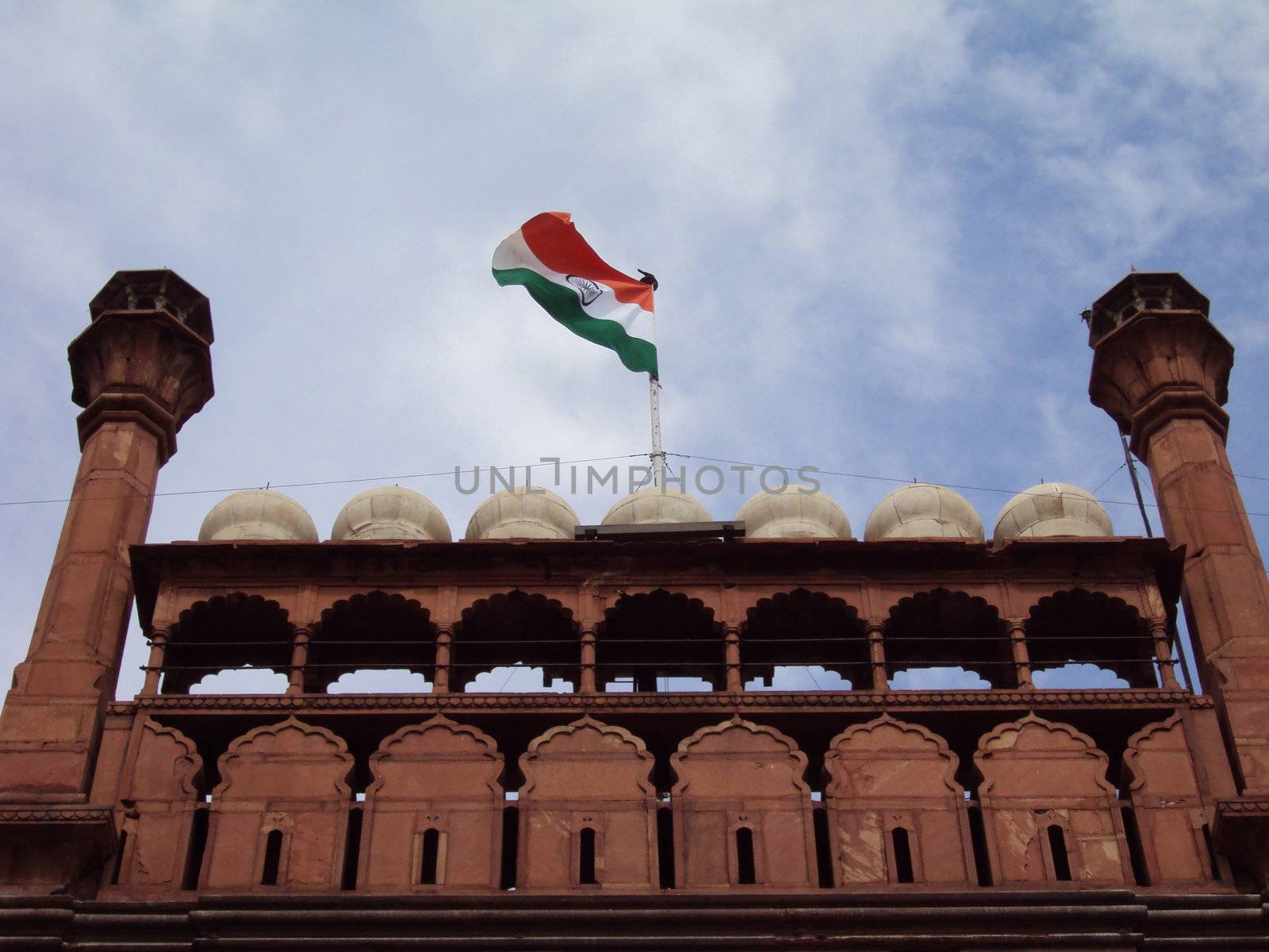 Indian Flag waving at the Red Fort in Delhi, India.