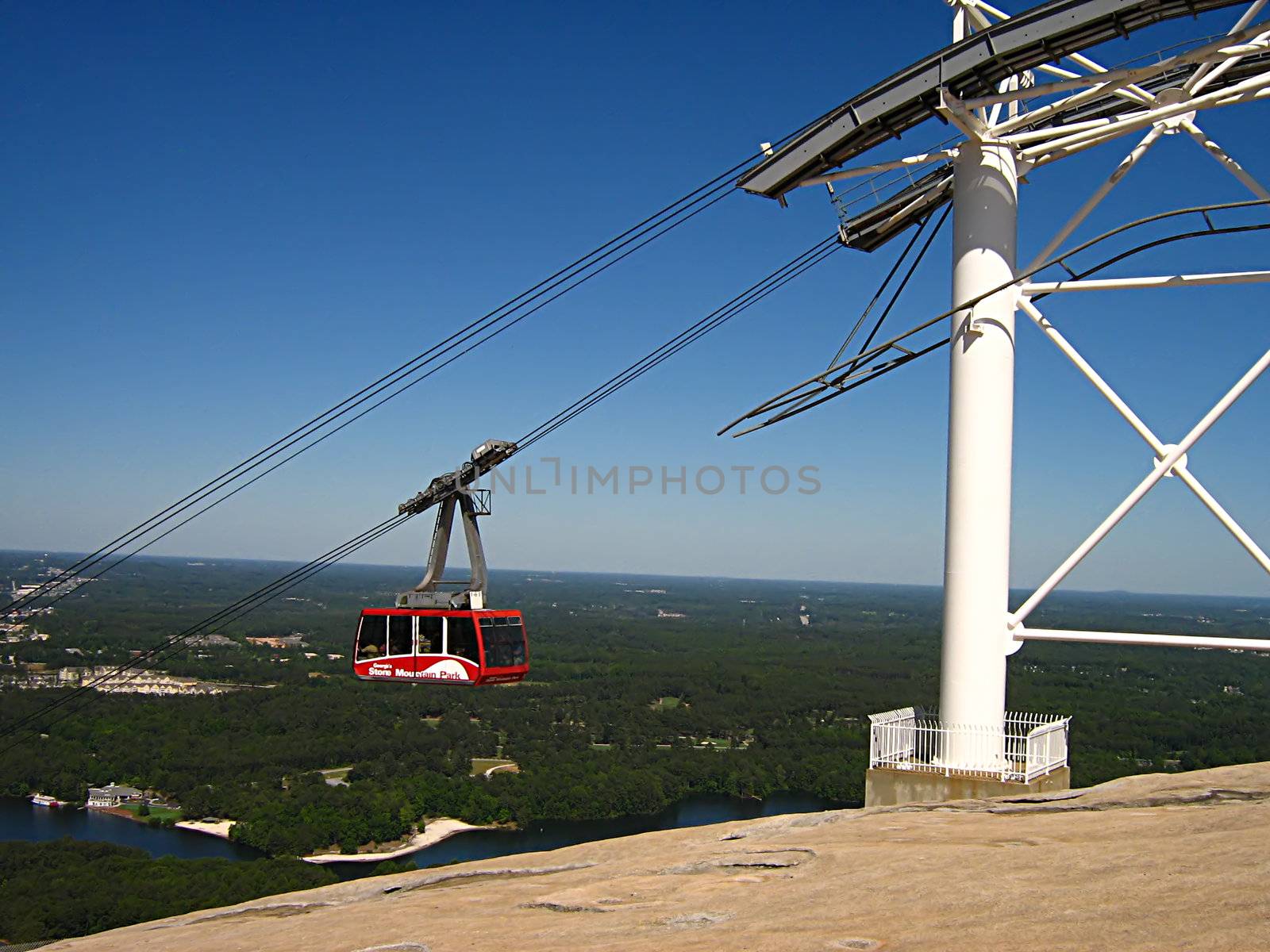 A photograph of a cable car in action.