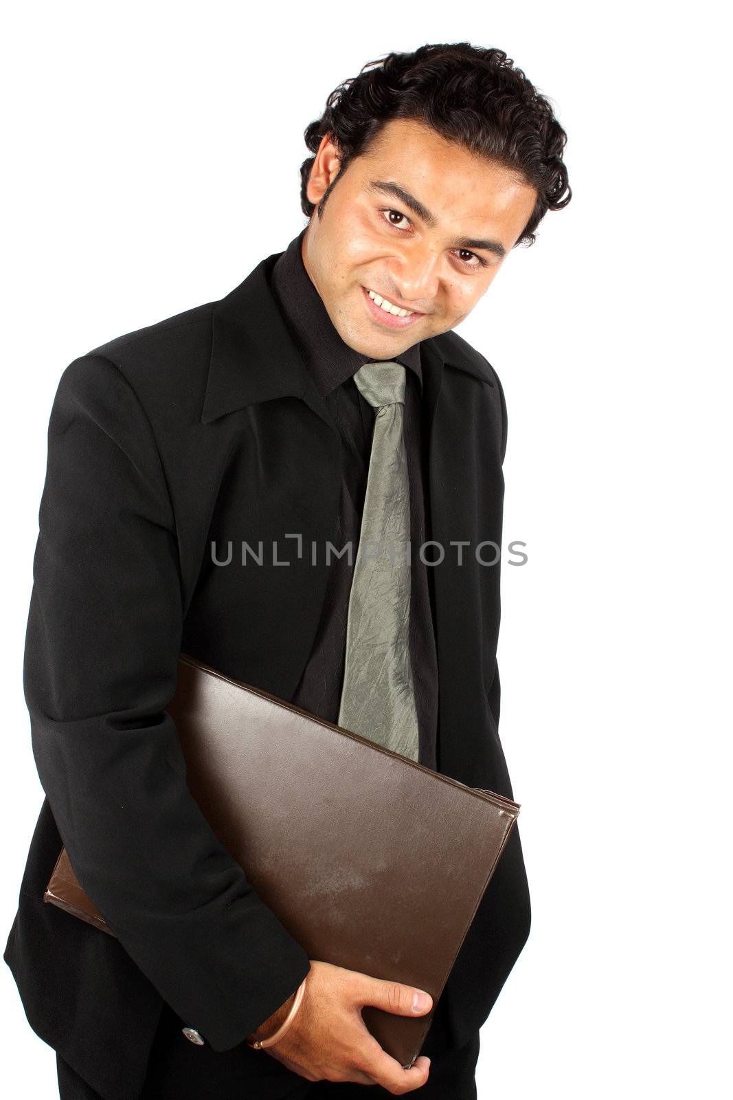 A confident young Indian businessman with a project file, on white studio background.