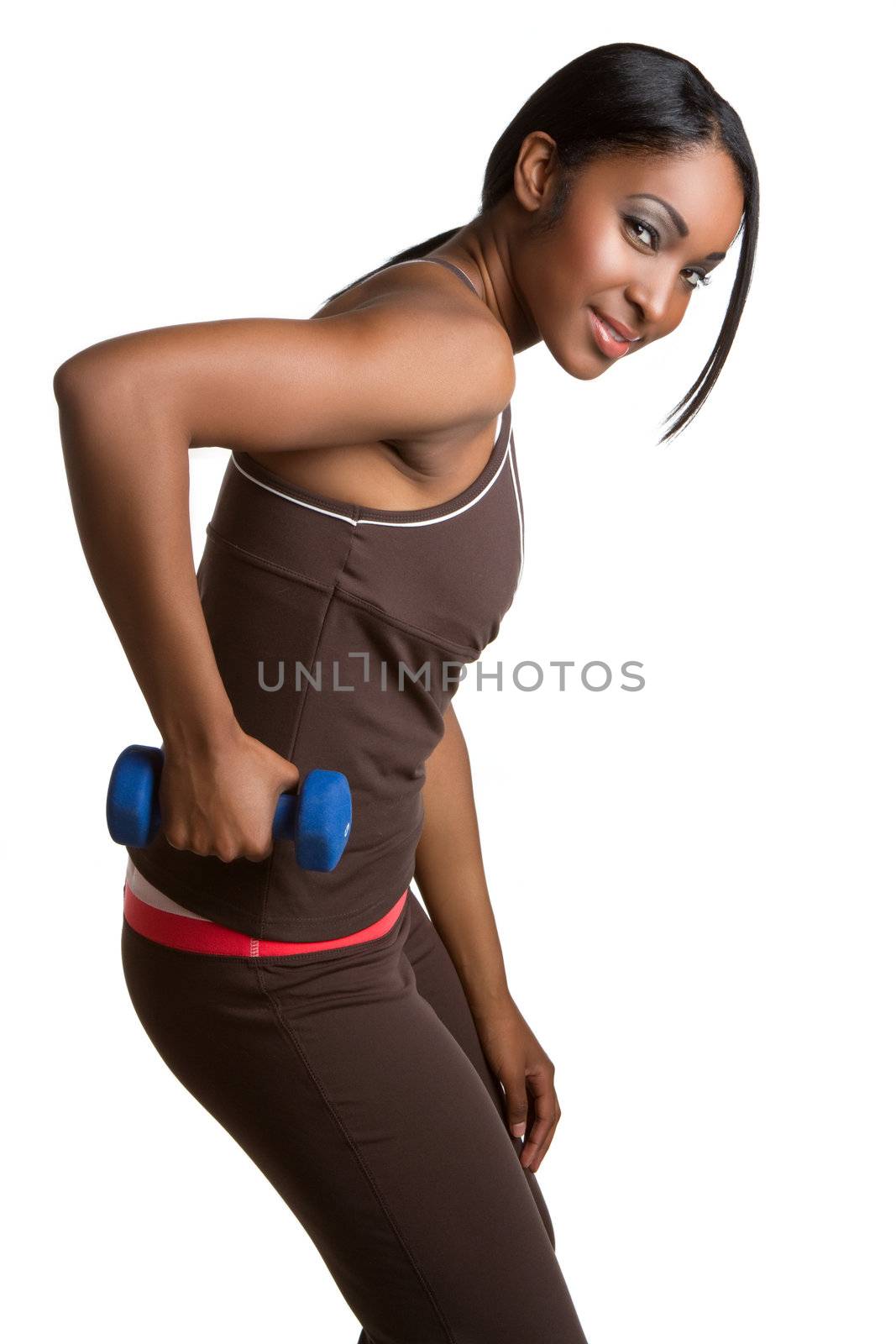 Beautiful black woman lifting weights