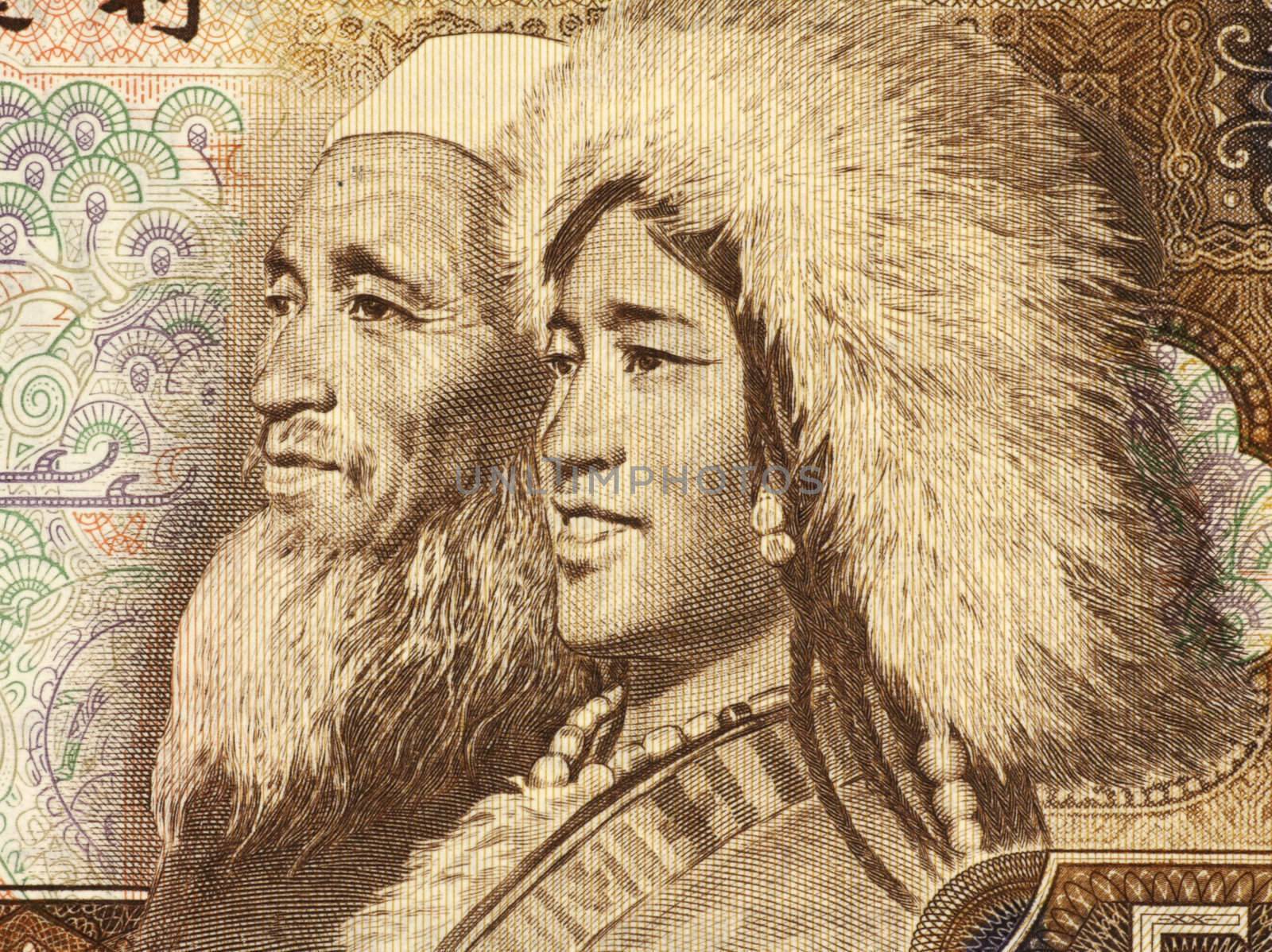 Old Tibetan Man and Young Islamic Woman on 5 Yuan 1980 Banknote from China.
