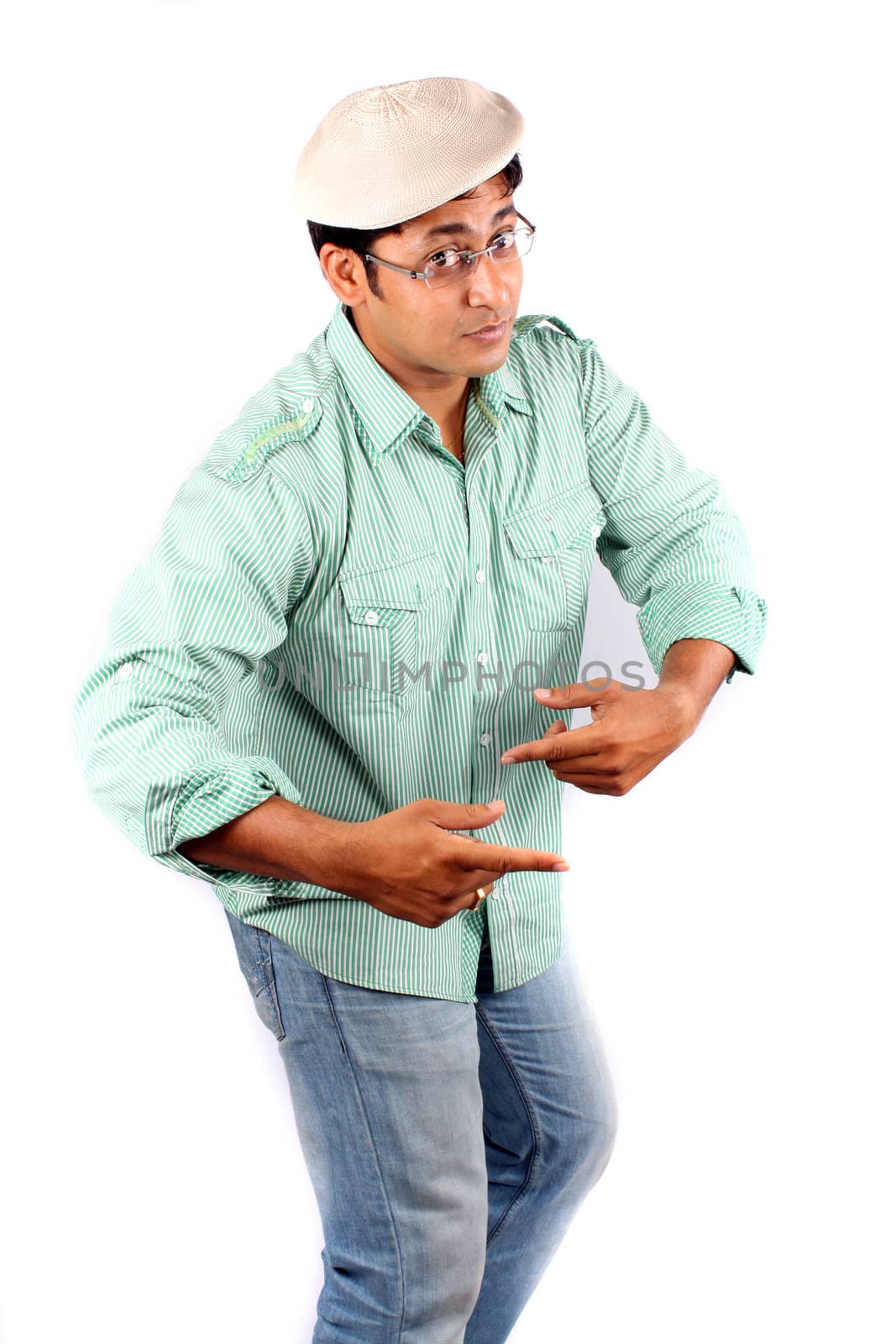An Indian actor in a funny mood, on white studio background.
