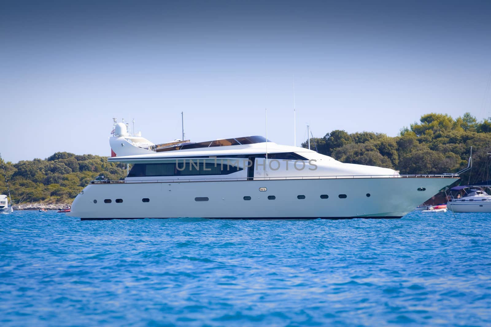 Luxury yacht in a bay on a hot summer day