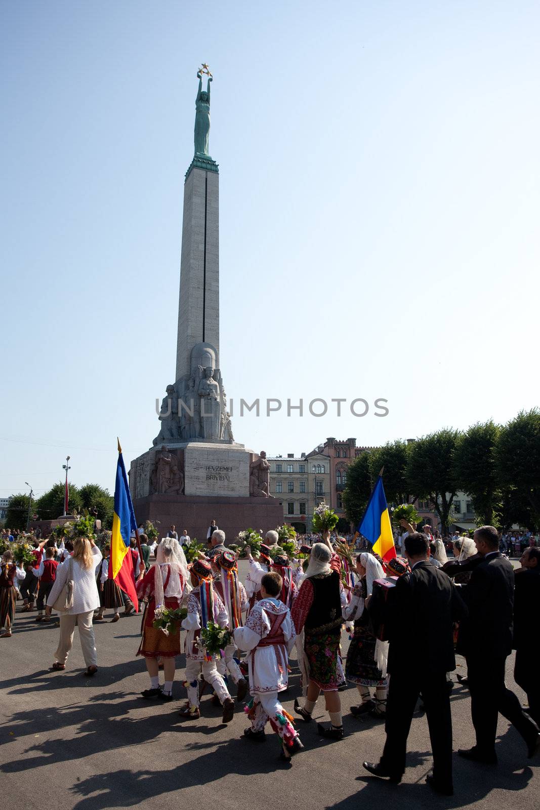 RIGA, LATVIA - JULY 10: A parade by festival participants of Latvian Youth Song and Dance Celebration through the centre of Riga, 10 July, 2010