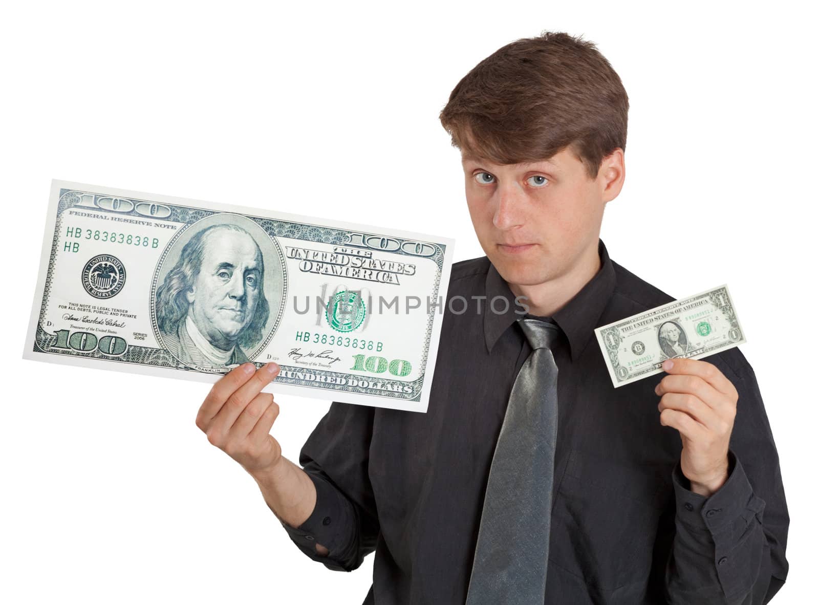 A young man holding a large and small money on white