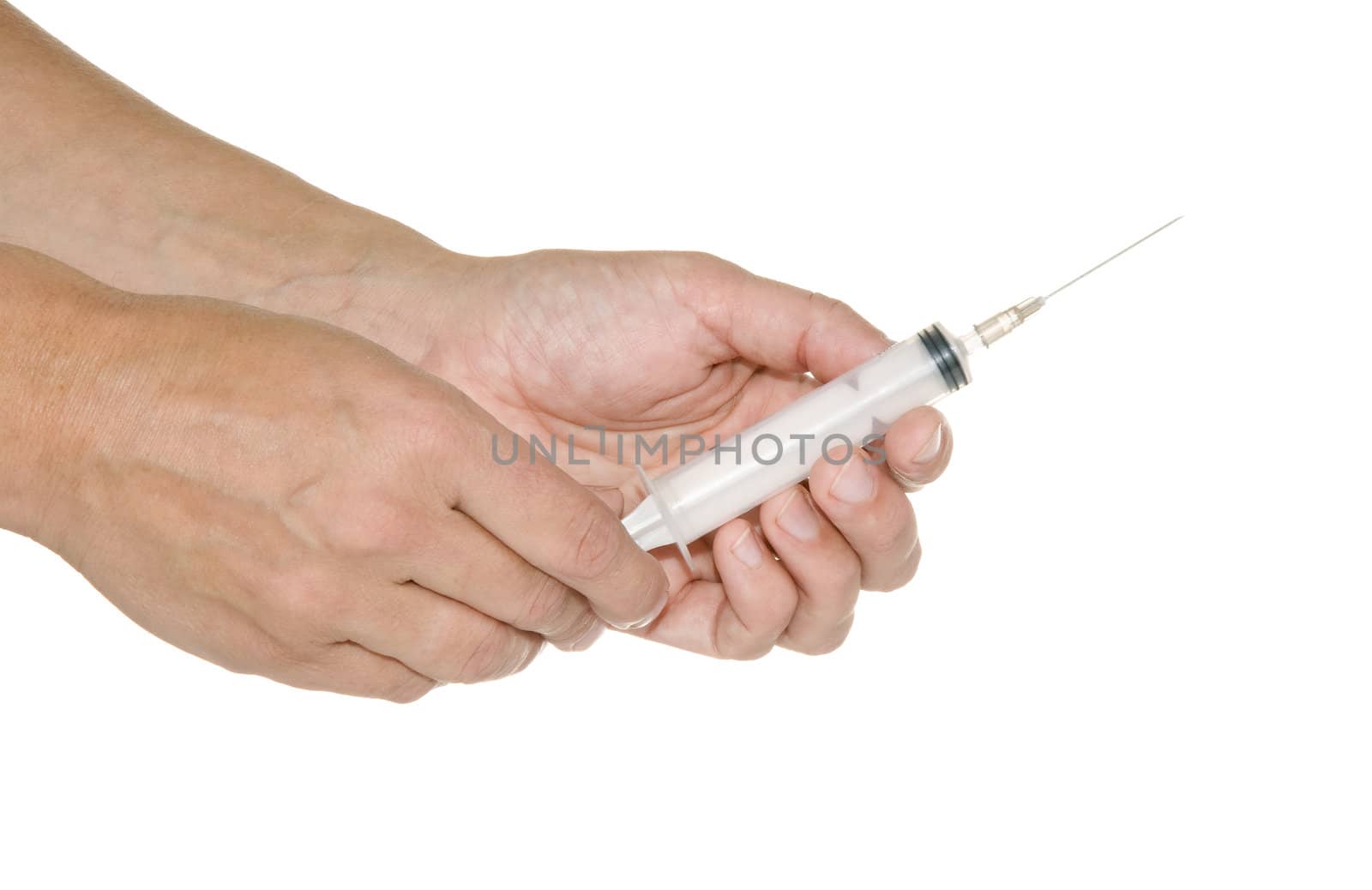 syringe in his hand on a white background