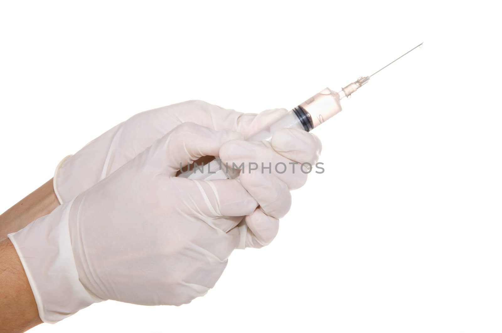 syringe in his hand on a white background