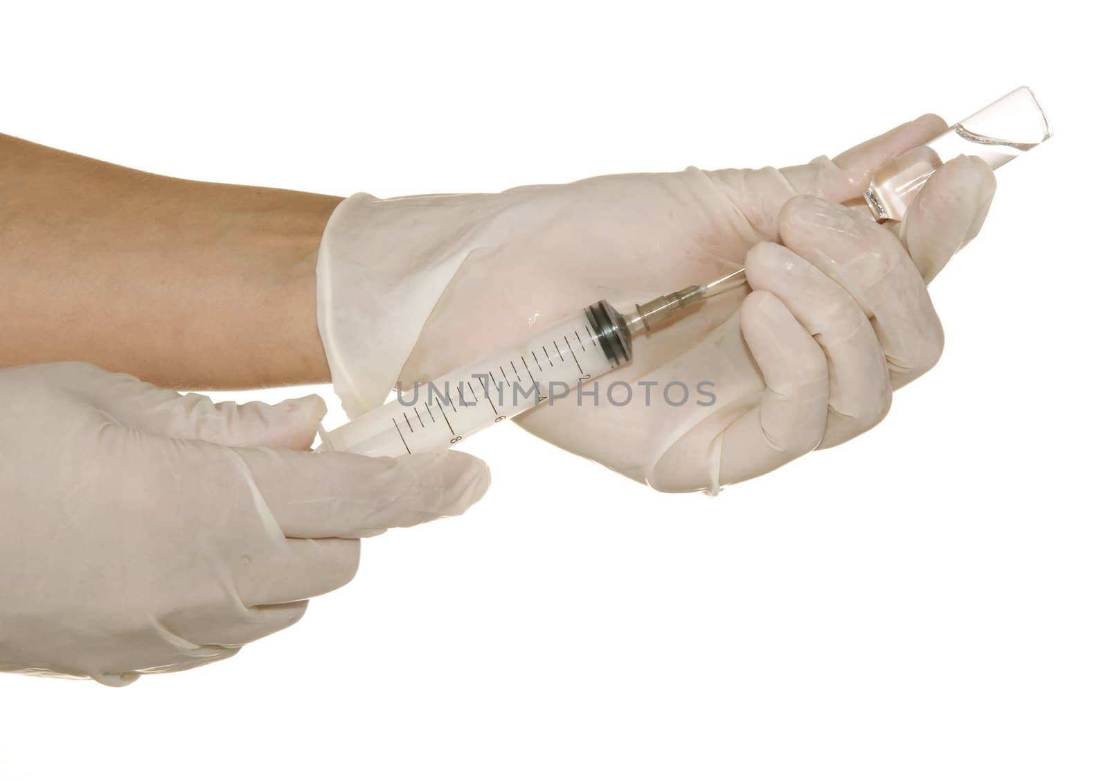 syringe in his hand on a white background