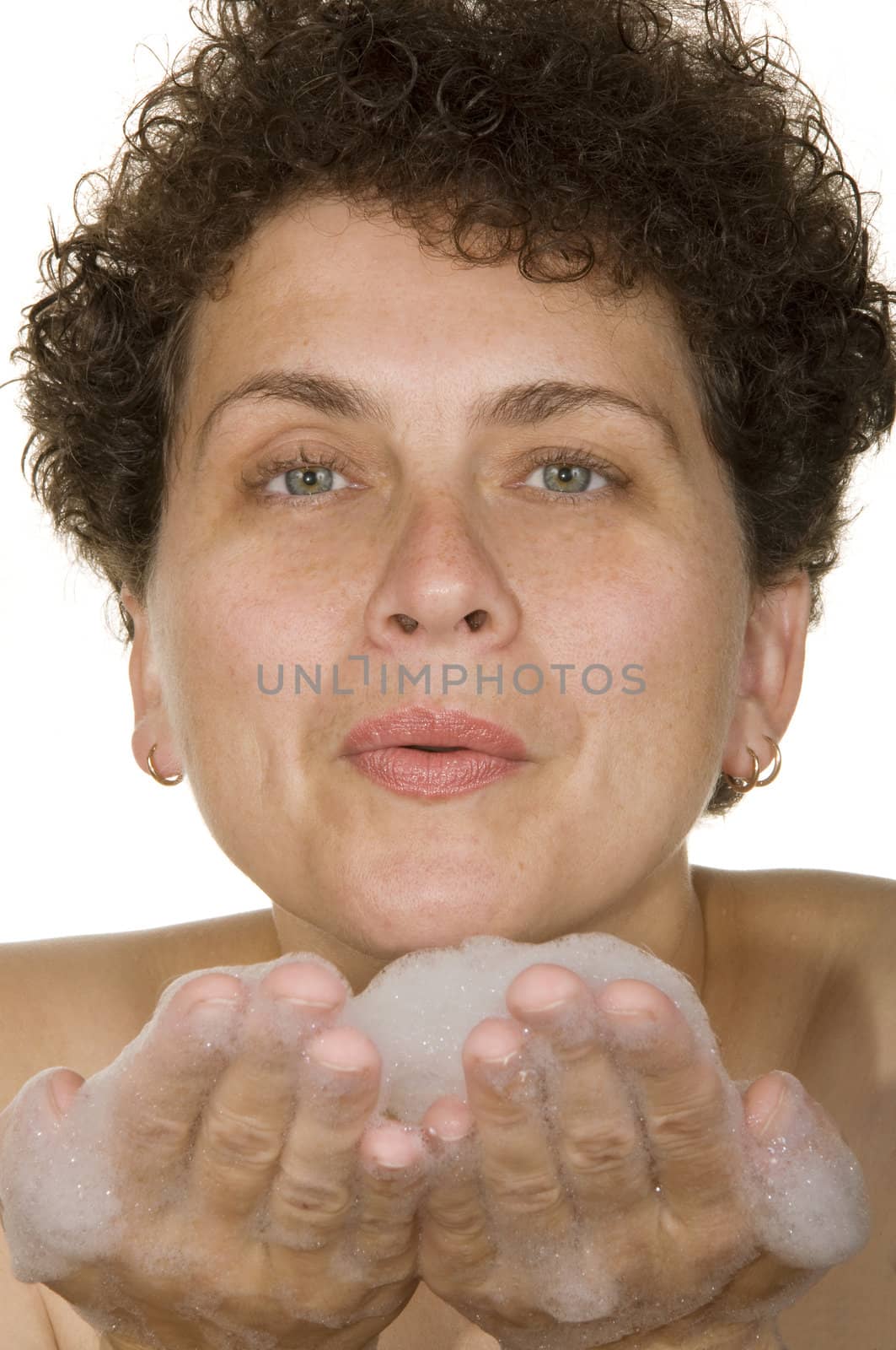 woman on a white background washes foam