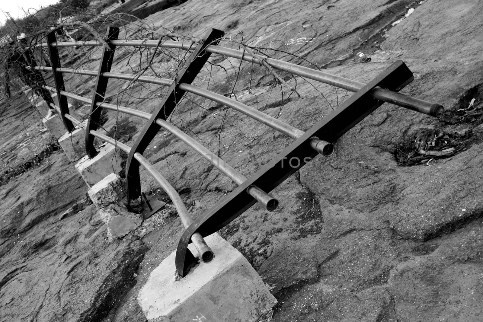 A metaphorical image of a broken fence depicting broken boundry.