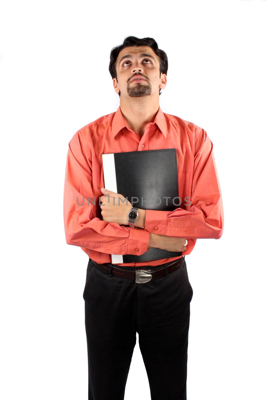 A young unemployed Indian man worried about his job interview, on white studio background.