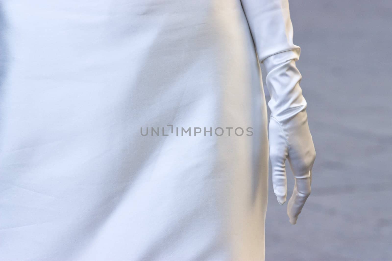 Particular view of a bride dress during the wedding