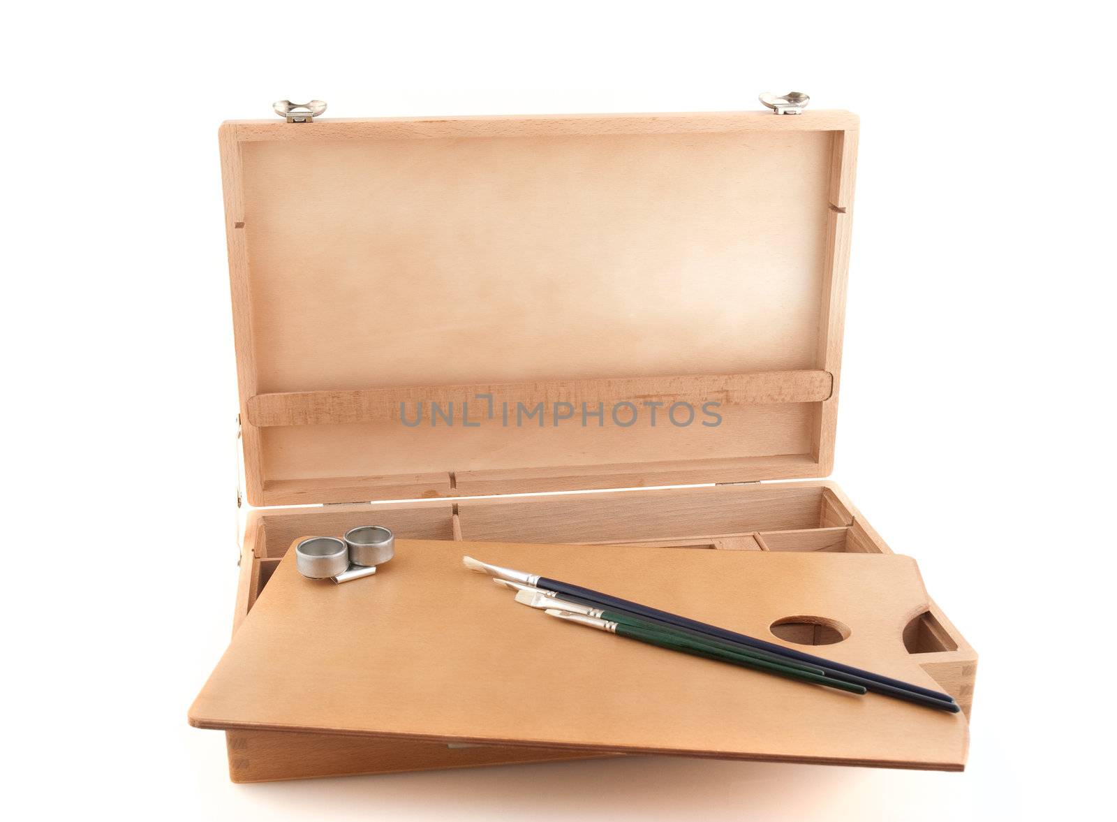 Wooden painter case with brushes on white background.
