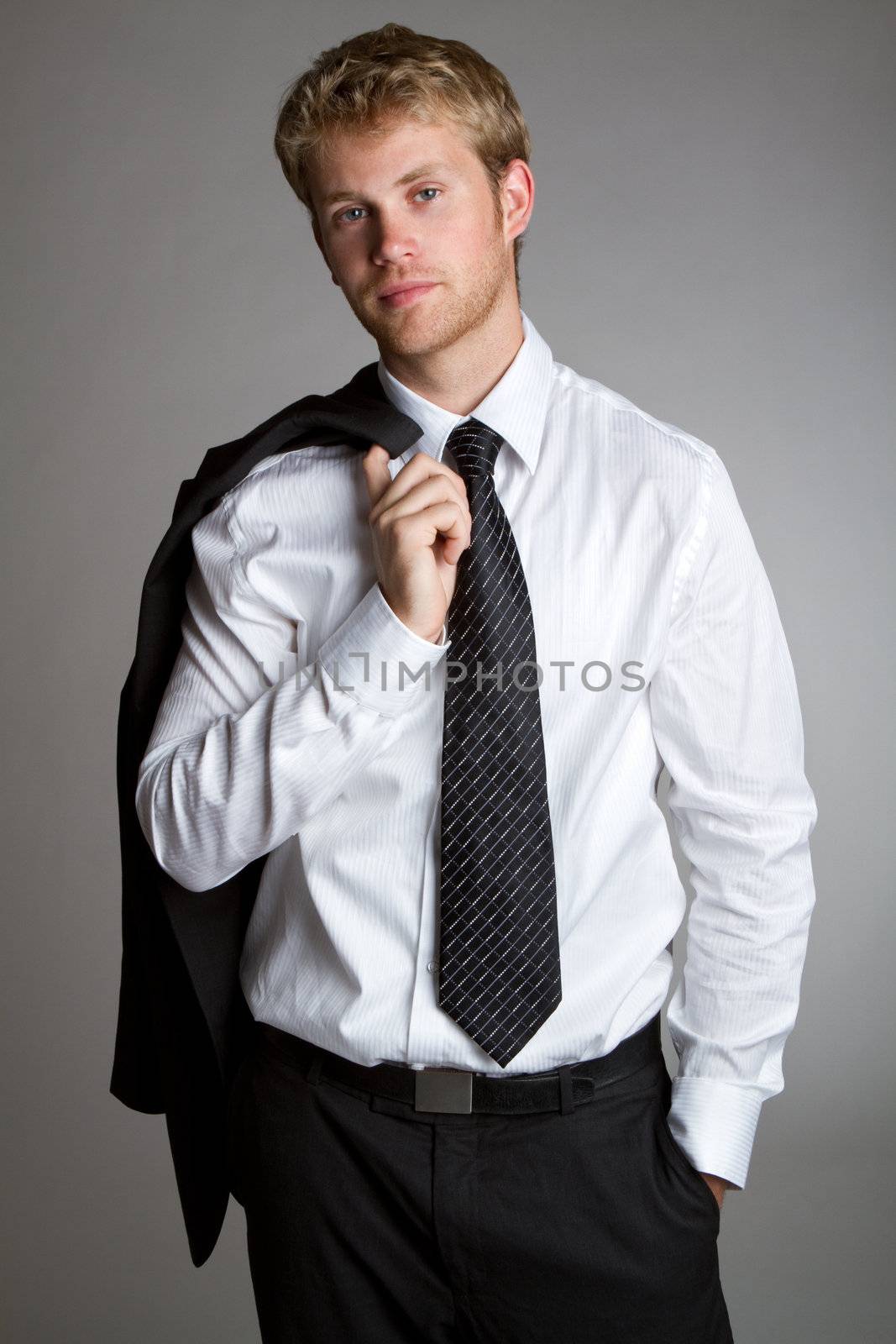 Handsome young businessman wearing suit