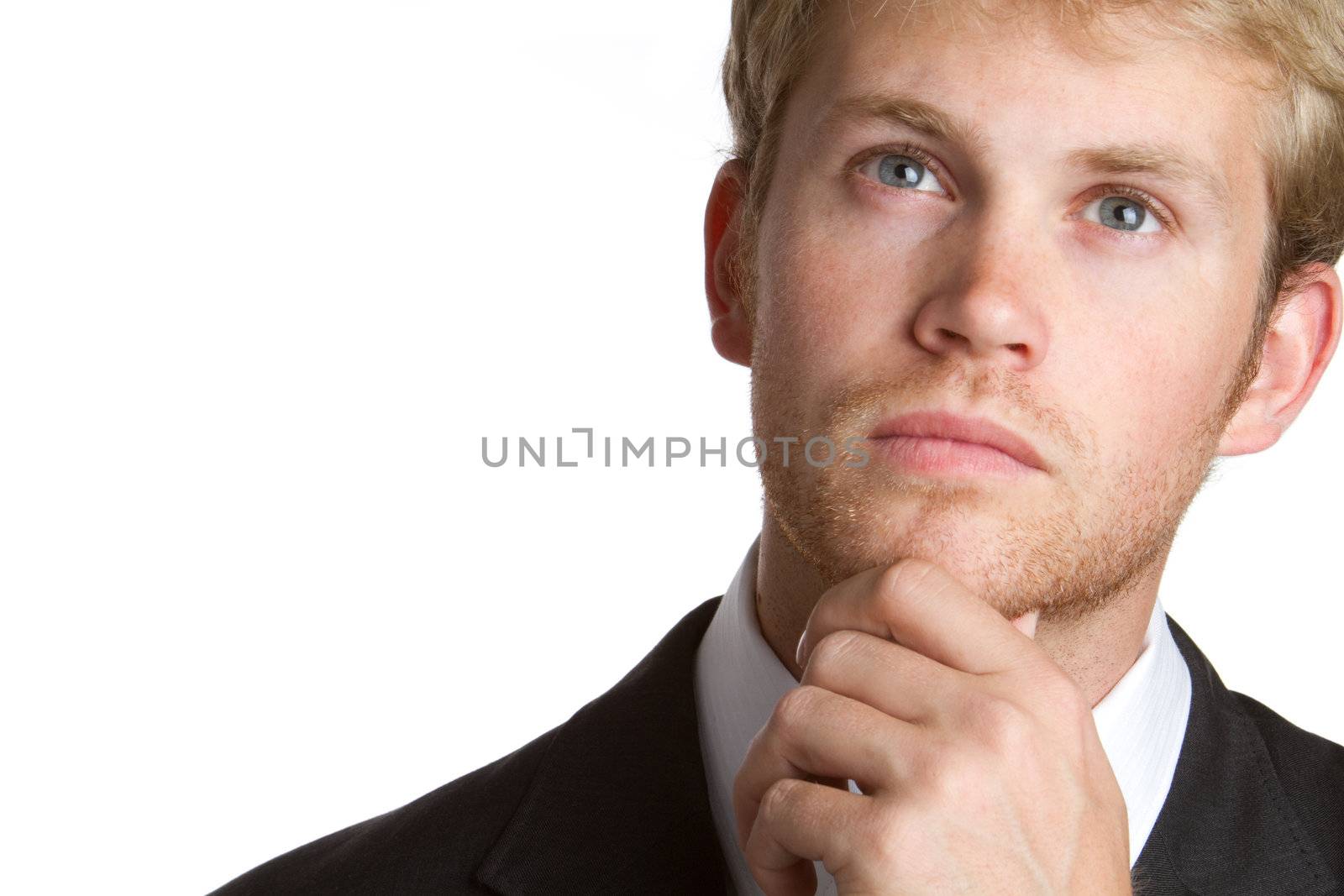 Young businessman thinking portrait closeup