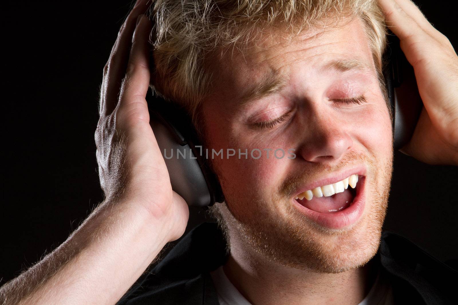 Young man singing music