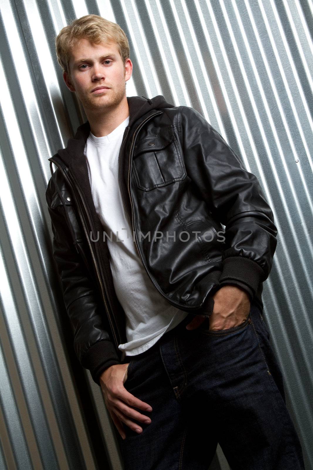 Young man wearing leather jacket